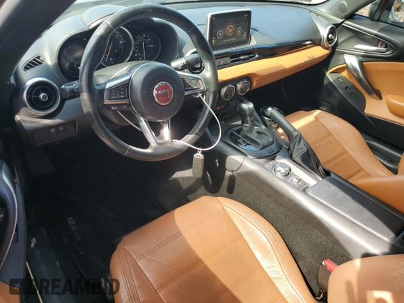 2017 FIAT 124 Spider Lusso z VIN JC1NFAEK7H0123436, wystawiony jako Copart lot #56169965 z przebiegiem 133 320 mil mil oraz Czysty tytuł • Clean title. Historia ofert i sprzedaży dostępna na DreamBid. Obrazek 8.