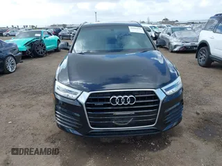 2016 Audi Q3 Prestige with VIN WA1GFCFS8GR003333, listed as a IAAI auction lot 41924542 with 116,360 mi miles. Bid and sale history available at carsss.com. Image 12.