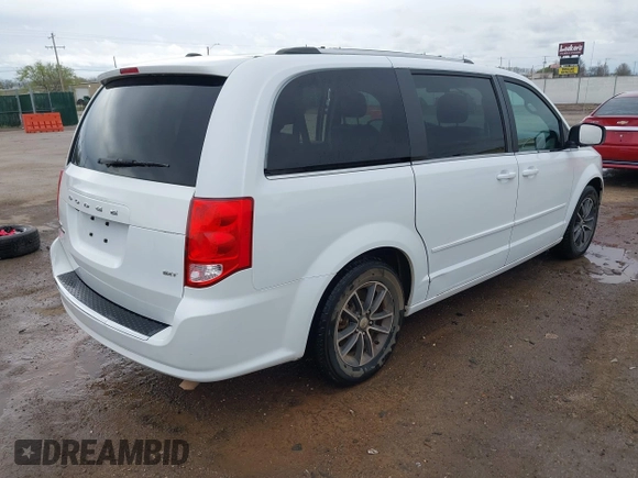 2017 Dodge Grand Caravan SXT with VIN 2C4RDGCG4HR662744, listed as a IAAI auction lot 41910753 with 73,060 mi miles and . Bid and sale history available at DreamBid. Image 4.