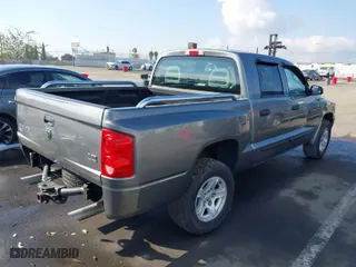 2005 Dodge Dakota SLT with VIN 1D7HE48N75S365305, listed as a IAAI auction lot 41450254 with 181,941 mi miles. Bid and sale history available at carsss.com. Image 4.