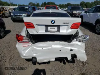 2011 BMW 3 Series 335i xDrive with VIN WBAKF9C51BE620023, listed as a Copart auction lot 60287515 with 123,353 mi miles and Salvage title. Bid and sale history available at DreamBid. Image 6.
