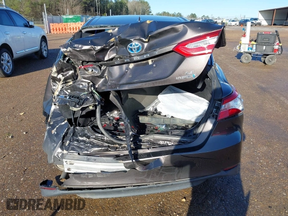 2019 Toyota Camry Hybrid LE z VIN 4T1B31HK4KU516123, wystawiony jako IAAI lot #41733410 z przebiegiem 98 273 mil mil oraz . Historia ofert i sprzedaży dostępna na DreamBid. Obrazek 6.