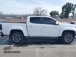2021 Chevrolet Colorado 2WD Work Truck z VIN 1GCGSBENXM1118310, wystawiony jako IAAI lot #41668804 z przebiegiem 65 295 mil mil oraz . Historia ofert i sprzedaży dostępna na DreamBid. Obrazek 14.