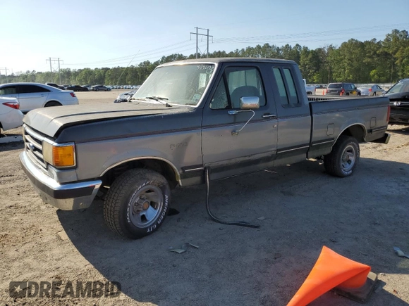 1990 Ford F-150 with VIN 1FTEX15NXLKA72702, listed as a Copart auction lot 52421535 with 720,181 mi miles and Clean Title. Bid and sale history available at carsss.com. Image 1.