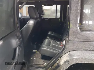 2015 Jeep Wrangler Unlimited Sahara with VIN 1C4BJWEG6FL688382, listed as a IAAI auction lot 41620621 with 138,119 mi miles. Bid and sale history available at carsss.com. Image 8.