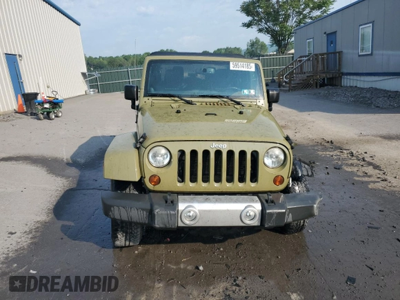 2013 Jeep Wrangler Sahara с VIN 1C4AJWBG0DL593166, выставлен на аукционе Copart как лот 59514185 с пробегом 98 368 миль миль и Списание • Salvage title. История ставок и продаж доступна на DreamBid. Изображение 5.