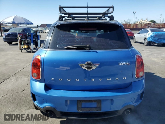 2013 MINI Countryman S with VIN WMWZC3C51DWP23167, listed as a Copart auction lot 63933185 with 72,329 mi miles and Salvage title. Bid and sale history available at DreamBid. Image 6.