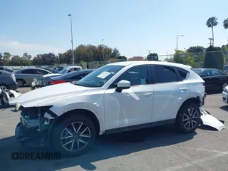 2018 Mazda CX-5 Touring with VIN JM3KFACM0J0416716, listed as a IAAI auction lot 42150121 with 61,332 mi miles and . Bid and sale history available at carsss.com. Image 15.