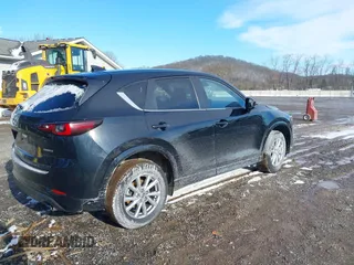 2024 Mazda CX-5 2.5 S Carbon Edition with VIN JM3KFBCL5R0413304, listed as a IAAI auction lot 41599750 with 26,434 mi miles. Bid and sale history available at carsss.com. Image 4.