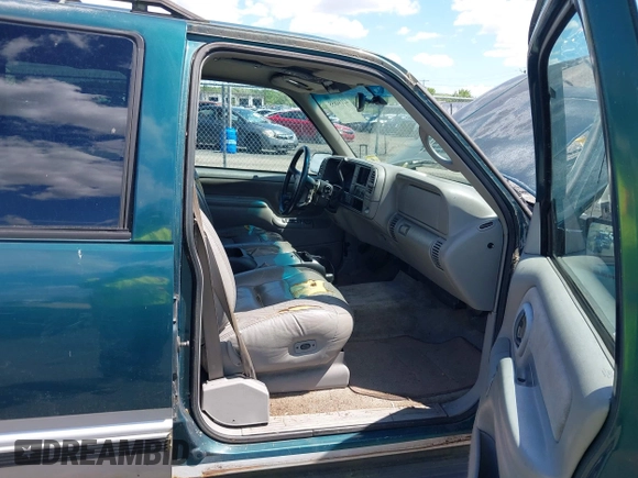 1997 GMC Suburban with VIN 1GKFK16R6VJ706590, listed as a IAAI auction lot 42194855 with 155,680 mi miles and . Bid and sale history available at DreamBid. Image 5.