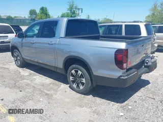 2020 Honda Ridgeline RTL with VIN 5FPYK3F5XLB019296, listed as a IAAI auction lot 42204290 with 48,197 mi miles and . Bid and sale history available at DreamBid. Image 3.