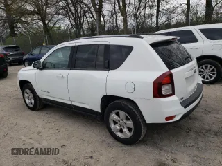 2016 Jeep Compass High Altitude Edition with VIN 1C4NJCEA0GD769610, listed as a Copart auction lot 52746435 with 136,849 mi miles and Salvage Title. Bid and sale history available at carsss.com. Image 2.