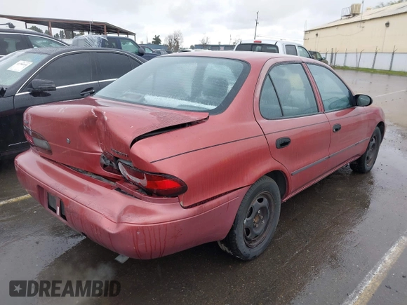 1997 Geo Prizm LSi with VIN 1Y1SK5265VZ457659, listed as a IAAI auction lot 41778510 with 149,073 mi miles. Bid and sale history available at carsss.com. Image 4.