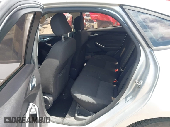 2015 Ford Focus SE with VIN 1FADP3F28FL205635, listed as a IAAI auction lot 42535860 with 135,994 mi miles and . Bid and sale history available at DreamBid. Image 8.