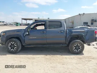 2021 Toyota Tacoma 4WD SR with VIN 3TMCZ5AN4MM387519, listed as a IAAI auction lot 41769922 with 61,813 mi miles. Bid and sale history available at carsss.com. Image 15.