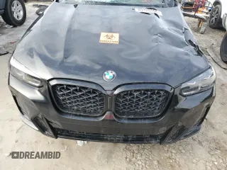 2024 BMW X4 xDrive30i z VIN 5UX33DT02R9U91458, wystawiony jako Copart lot #89126955 z przebiegiem Nie podano mil oraz Szkoda całkowita • Salvage title. Historia ofert i sprzedaży dostępna na DreamBid. Obrazek 13.