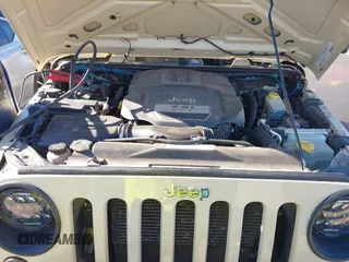 2012 Jeep Wrangler Unlimited Sport z VIN 1C4BJWDG8CL102486, wystawiony jako IAAI lot #41386649 z przebiegiem 156 993 mil mil oraz . Historia ofert i sprzedaży dostępna na DreamBid. Obrazek 10.