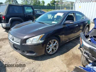 2014 Nissan Maxima S with VIN 1N4AA5AP5EC480297, listed as a IAAI auction lot 42572233 with 79,101 mi miles and . Bid and sale history available at DreamBid. Image 2.