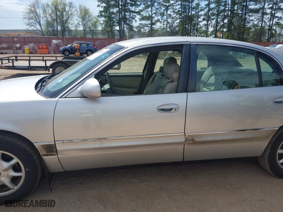 2003 Buick Park Avenue with VIN 1G4CW54K334100140, listed as a IAAI auction lot 41874244 with 85,201 mi miles. Bid and sale history available at carsss.com. Image 6.