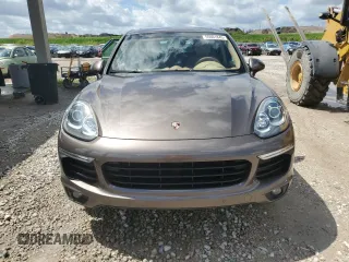 2016 Porsche Cayenne z VIN WP1AA2A22GKA11334, wystawiony jako Copart lot #55961845 z przebiegiem 73 174 mil mil oraz Szkoda całkowita • Salvage title. Historia ofert i sprzedaży dostępna na DreamBid. Obrazek 5.