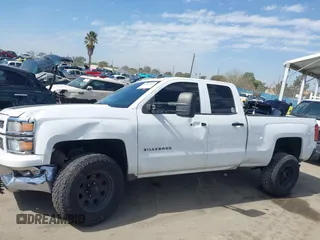 2014 Chevrolet Silverado 1500 LT with VIN 1GCRCREC8EZ347598, listed as a IAAI auction lot 41688554 with 116,298 mi miles and . Bid and sale history available at DreamBid. Image 14.