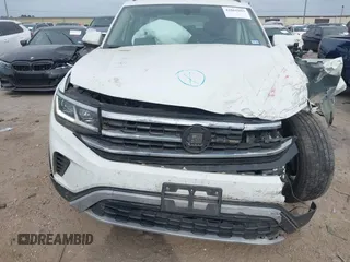 2021 Volkswagen Atlas SE with VIN 1V2WR2CA3MC570349, listed as a IAAI auction lot 42065993 with 83,362 mi miles and . Bid and sale history available at DreamBid. Image 12.