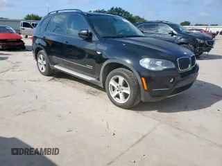 2012 BMW X5 35i с VIN 5UXZV4C52CL988794, выставлен на аукционе Copart как лот 61688485 с пробегом Не указан миль и Чистый • Clean title. История ставок и продаж доступна на DreamBid. Изображение 4.