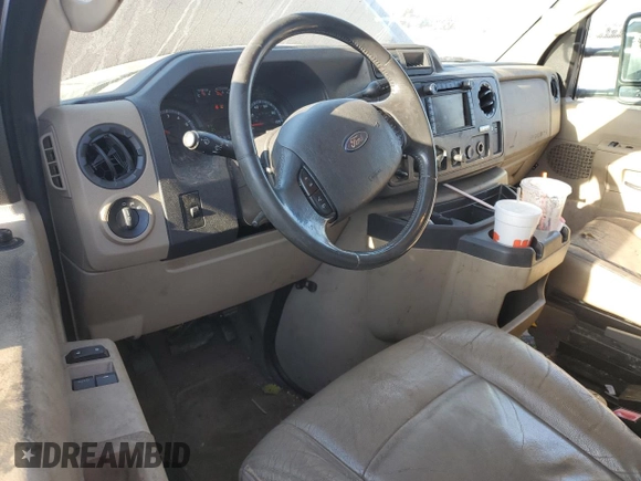 2010 Ford Econoline Passenger XL with VIN 1FMNE1BW6ADA87472, listed as a Copart auction lot 74989314 with 215,315 mi miles and Salvage Title. Bid and sale history available at DreamBid. Image 8.