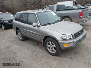 1999 Toyota RAV4 with VIN JT3HP10V8X7137998, listed as a IAAI auction lot 40954121 with 132,824 mi miles. Bid and sale history available at carsss.com. Image 1.
