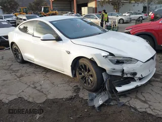2016 Tesla Model S 90D with VIN 5YJSA1E2XGF144477, listed as a IAAI auction lot 41535359 with Not Provided miles and . Bid and sale history available at DreamBid. Image 1.