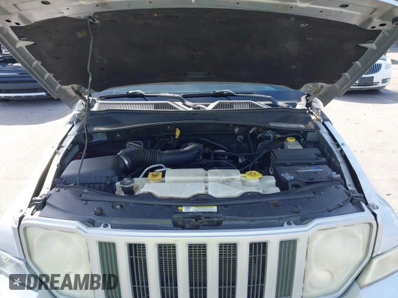2011 Jeep Liberty Sport Jet with VIN 1J4PN2GK1BW566617, listed as a IAAI auction lot 41789607 with 225,536 mi miles. Bid and sale history available at carsss.com. Image 10.