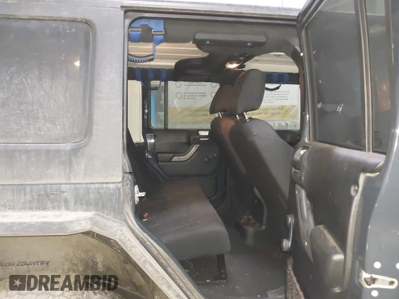 2018 Jeep Wrangler JK Unlimited Sport with VIN 1C4BJWDG0JL867687, listed as a IAAI auction lot 41426838 with 78,116 mi miles. Bid and sale history available at carsss.com. Image 8.