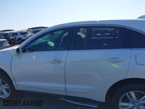 2015 Acura RDX Technology z VIN 5J8TB3H56FL018438, wystawiony jako IAAI lot #42368942 z przebiegiem Nie podano mil oraz . Historia ofert i sprzedaży dostępna na DreamBid. Obrazek 13.