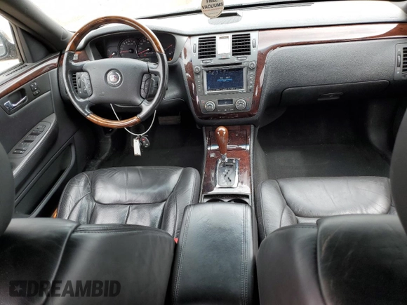 2007 Cadillac DTS Performance with VIN 1G6KD57937U201301, listed as a Copart auction lot 52868565 with 119,972 mi miles and Salvage Title. Bid and sale history available at carsss.com. Image 8.
