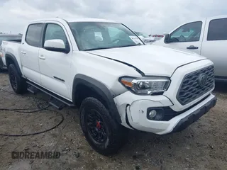2020 Toyota Tacoma SR5 z VIN 3TMCZ5AN6LM308723, wystawiony jako IAAI lot #41966108 z przebiegiem 78 454 mil mil oraz . Historia ofert i sprzedaży dostępna na DreamBid. Obrazek 1.