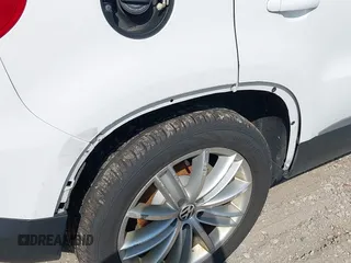 2012 Volkswagen Tiguan SEL with VIN WVGAV7AX5CW517186, listed as a IAAI auction lot 42177269 with 142,285 mi miles and . Bid and sale history available at DreamBid. Image 13.