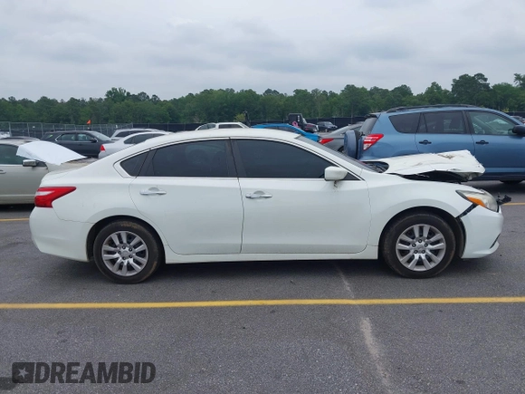 2016 Nissan Altima S z VIN 1N4AL3APXGN345029, wystawiony jako IAAI lot #42359083 z przebiegiem 210 555 mil mil oraz . Historia ofert i sprzedaży dostępna na DreamBid. Obrazek 13.