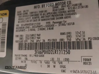 2020 Ford Fusion SE z VIN 3FA6P0HD2LR121250, wystawiony jako IAAI lot #42200163 z przebiegiem 161 111 mil mil oraz . Historia ofert i sprzedaży dostępna na DreamBid. Obrazek 9.