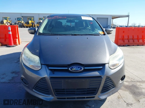 2013 Ford Focus SE with VIN 1FADP3K21DL220268, listed as a IAAI auction lot 41696862 with 118,306 mi miles and . Bid and sale history available at DreamBid. Image 12.