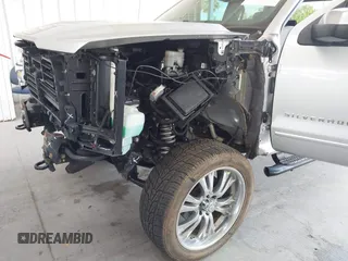 2019 Chevrolet Silverado 1500 LT with VIN 2GCVKPEC4K1139373, listed as a IAAI auction lot 42198276 with 76,844 mi miles and . Bid and sale history available at DreamBid. Image 6.