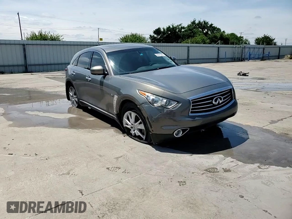 2015 Infiniti QX70 with VIN JN8CS1MW1FM481491, listed as a Copart auction lot 58841045 with 196,155 mi miles and Salvage title. Bid and sale history available at DreamBid. Image 14.