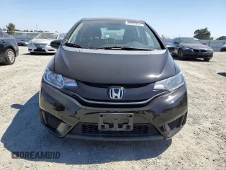 2015 Honda Fit LX with VIN 3HGGK5H52FM706660, listed as a Copart auction lot 60261745 with 118,954 mi miles and Salvage title. Bid and sale history available at DreamBid. Image 5.