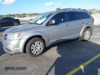 2016 Dodge Journey SE with VIN 3C4PDCAB2GT194810, listed as a IAAI auction lot 41559149 with 104,551 mi miles and . Bid and sale history available at DreamBid. Image 2.