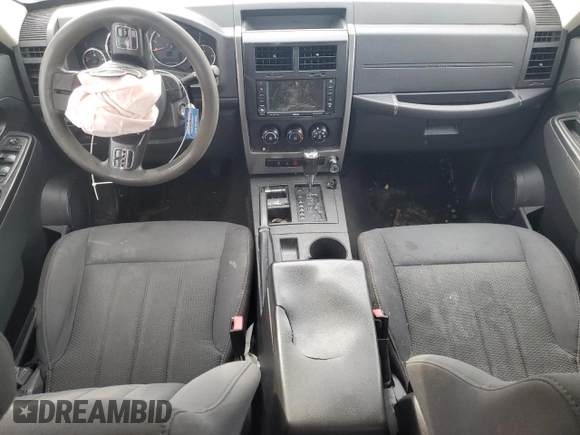 2011 Jeep Liberty Sport z VIN 1J4PN2GK8BW593944, wystawiony jako Copart lot #52571105 z przebiegiem Nie podano mil oraz Nie do naprawy • Non repairable. Historia ofert i sprzedaży dostępna na DreamBid. Obrazek 8.