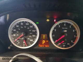 2012 BMW X6 M with VIN 5YMGZ0C57CLK14540, listed as a Copart auction lot 47419655 with 128,210 mi miles and Salvage Title. Bid and sale history available at carsss.com. Image 9.