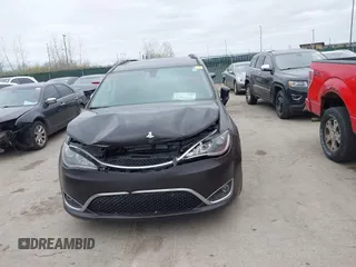 2017 Chrysler Pacifica Touring L with VIN 2C4RC1BG1HR797200, listed as a IAAI auction lot 42044020 with 124,115 mi miles and . Bid and sale history available at DreamBid. Image 12.