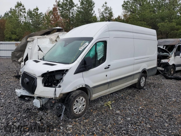 2021 Ford Transit Cargo with VIN 1FTBW3X89MKA74340, listed as a Copart auction lot 82188434 with 23,360 mi miles and Salvage Title. Bid and sale history available at carsss.com. Image 2.