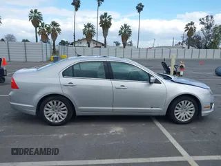 2010 Ford Fusion Hybrid with VIN 3FADP0L37AR261099, listed as a IAAI auction lot 41903543 with 160,070 mi miles. Bid and sale history available at carsss.com. Image 13.