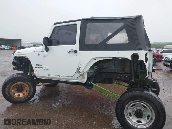 2013 Jeep Wrangler Sport with VIN 1C4AJWAG8DL601399, listed as a IAAI auction lot 42186399 with 130,195 mi miles and . Bid and sale history available at DreamBid. Image 15.