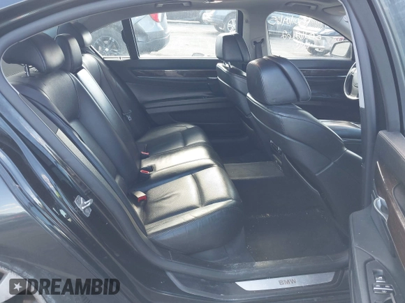 2011 BMW 7 Series 750Li xDrive with VIN WBAKC8C52BC434392, listed as a IAAI auction lot 41501172 with 99,389 mi miles. Bid and sale history available at carsss.com. Image 8.
